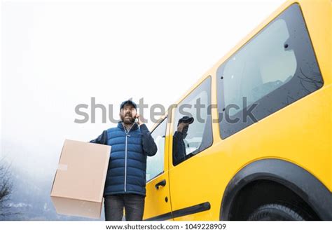 Delivery Man Delivering Parcel Box Recipient Stock Photo 1049228909