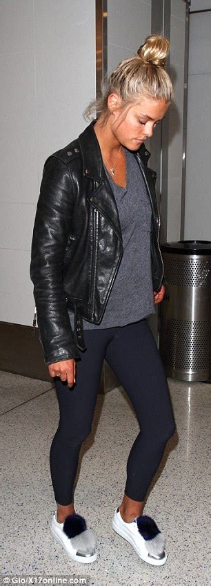 nina agdal rocks a biker jacket and leggings as she arrives at lax airport alone daily mail online
