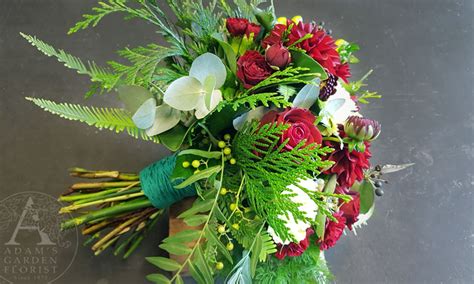 Wedding flower terminology, budget, tips and inspiration to help you make those pesky floral decisions. Red and Green Wedding Bouquet - Adam's Garden Florist