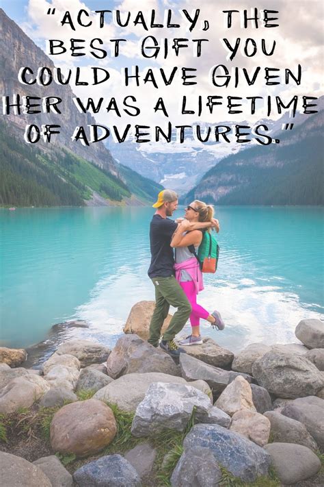 Two People Standing On Rocks Near The Water With An Inspirational Quote