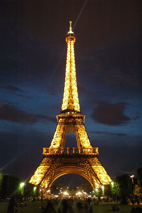 Eiffel Tower In Paris France The Eiffel Tower Lights Up At Night