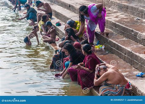 Indian People Live Pray And Take A Bath In The Ganges Ganga River At