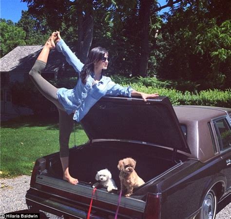 Hilaria Baldwin Uses Her Pooches In Latest Kooky Yoga Pose Daily Mail