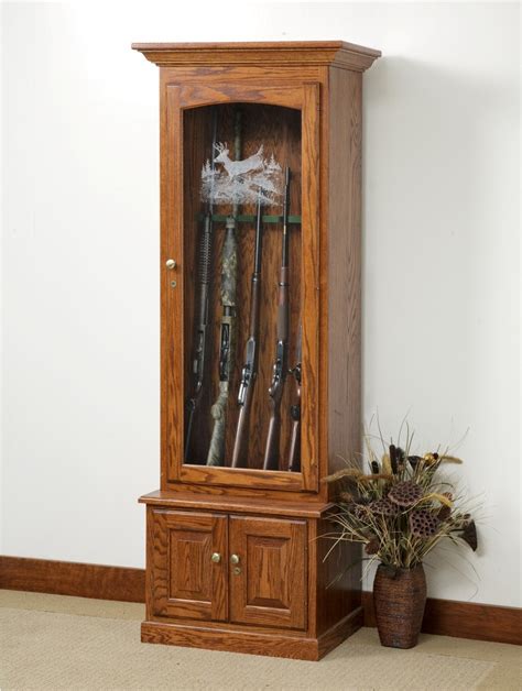 A wood cabinet is stylish, and it can be placed in any room of the house. 6 Gun Cabinet - Town & Country Furniture