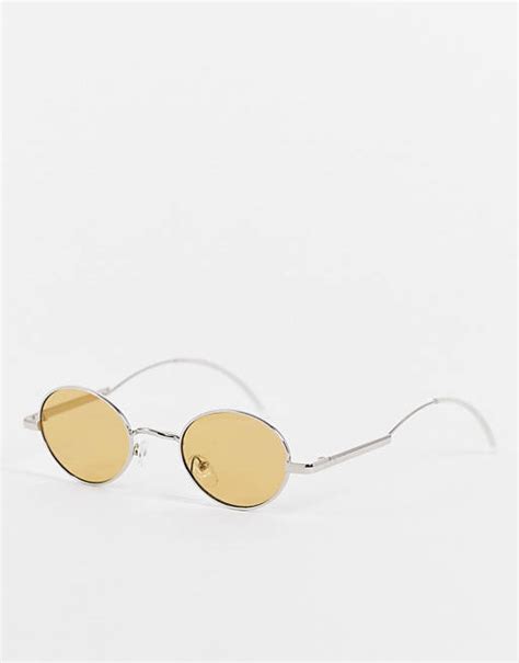 madein slim oval sunglasses in silver asos