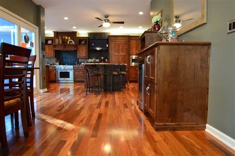 Pickled oak cabinets has me in a pickle over wall color! Brazilian walnut floors with knotty alder cabinets | Knotty alder cabinets, Brazilian walnut ...