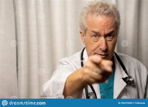 Photo Of A Doctor Pointing His Finger At You Stock Image Image Of