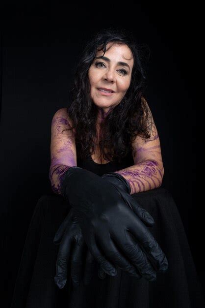 Premium Photo Closeup Of Beautiful Tattoo Artist Wearing Black Gloves