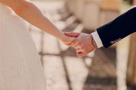 Close Up Of Just Married Couple Holding Hands Premium Photo Freepik