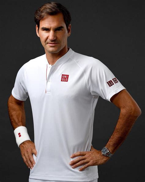 Rogerfederer Walks Onto Wimbledons Center Court Wearing Uniqlo