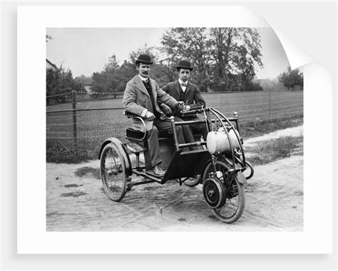 1900s Two Men In Bowler Hats Sitting In Three Wheel Motorized Horseless