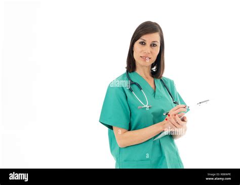 Portrait Of Serious Professional Female Doctor With Clipboard And
