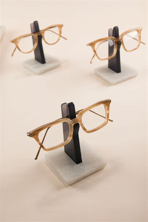 8 benefits of a spectacle holder wooden glasses holder eyewear store design eyeglass holder