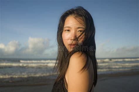 Beautiful Asian Woman Enjoying Sand And Sea Young Happy And
