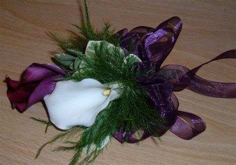 Purple And White Mini Calla Lilies Accented With Tree Fern And
