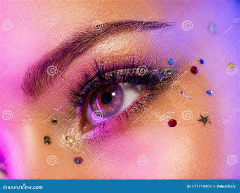 colorful makeup bright and intense makeup female eye close up with bright makeup stock image