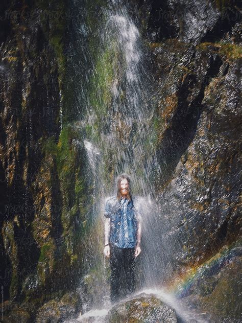 View Man Standing In Waterfall By Stocksy Contributor Michael Spear