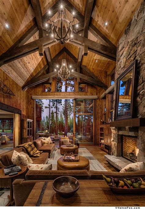 high wood beam ceilings  striped barn cabin interior design