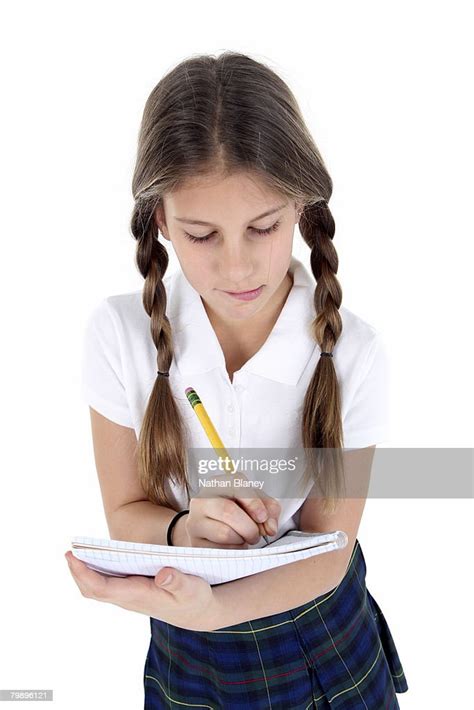 Girl Taking Notes High Res Stock Photo Getty Images