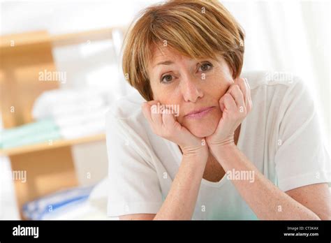 Portrait Of 65 Yr Old Woman Stock Photo Alamy