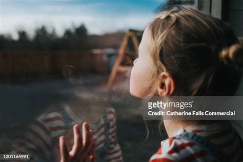 Pressing Nose Against Window Photos And Premium High Res Pictures