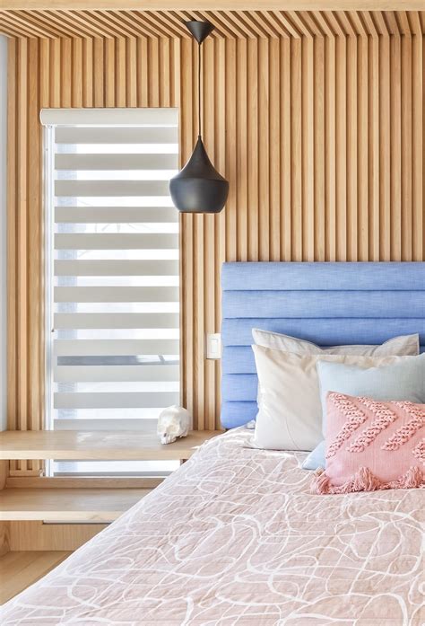 A Wood Accent Wall Adds Warmth To This Bedroom