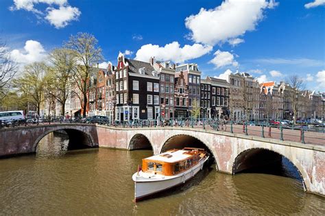 10 best ways to cruise the canals of amsterdam explore amsterdam along the city s famous