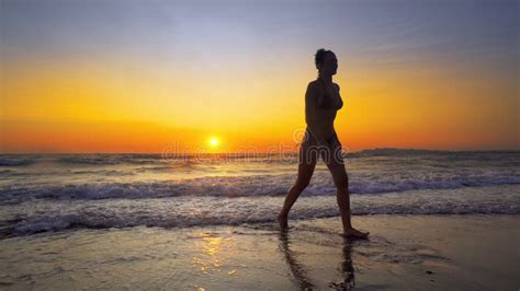 Girl Run Out Of Ocean Water At Sunset Stock Image Image Of Beach Ocean 107681505
