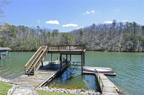 Five challenging golf courses surround the lake. Log Cabin Retreat | Smith Mountain Lake Cabin Rental ...