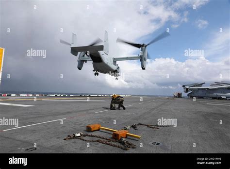 An Mv B Osprey Takes Off From The Amphibious Assault Ship Uss Bataan