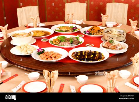Chinese Dishes At Dining Table Stock Photo Alamy