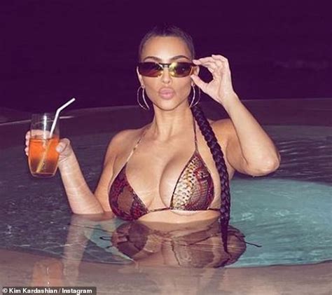 Kim Kardashian Showcases Her Incredible Curves While Posing In Tiny