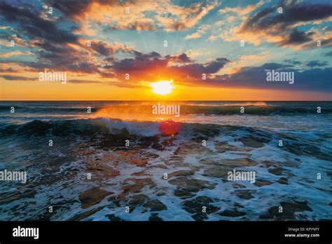 Beautiful Cloudscape Over The Sea Sunrise Shot Stock Photo Alamy