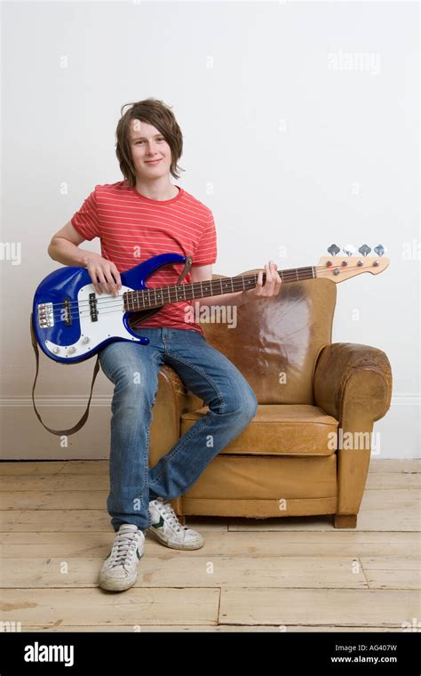 Teenage Boy Playing Guitar Stock Photo Alamy