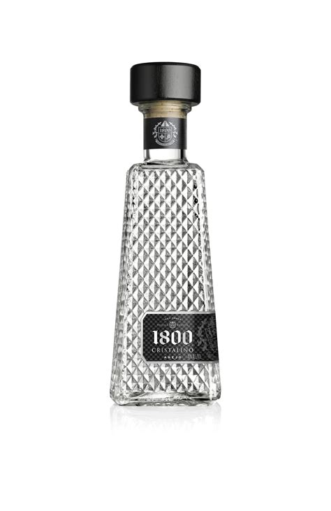 1800 Cristalino Añejo Tequila Comes In Luxe Cut Glass Prism Bottle Maxim