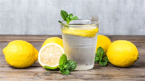 benefits of drinking lemon water you won t believe all of the benefits