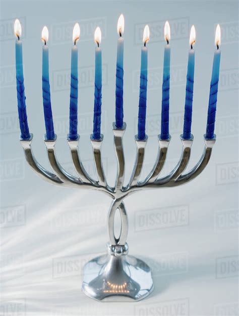 Close Up Of Menorah With Lit Candles Stock Photo Dissolve