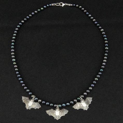 silver bat and pearl necklace by anna de ville pyramid gallery