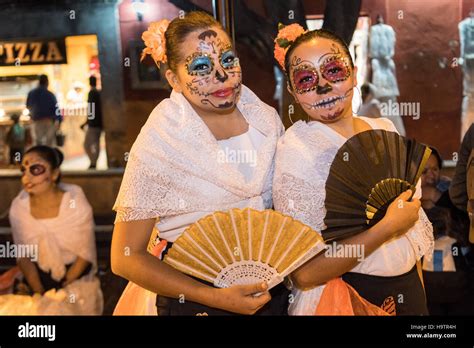 Young Women Dressed As La Calavera Catrina During The Day Of The Dead