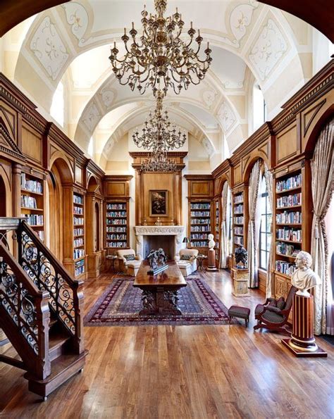 Sophisticated Library With Arched Beams And Chandelier Home Library