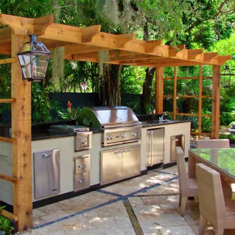 Step up your entertaining game with one of these diy outdoor kitchen plans that you can put outside on an existing patio, deck, or area of your yard. 30 Outdoor Kitchens and Grilling Stations