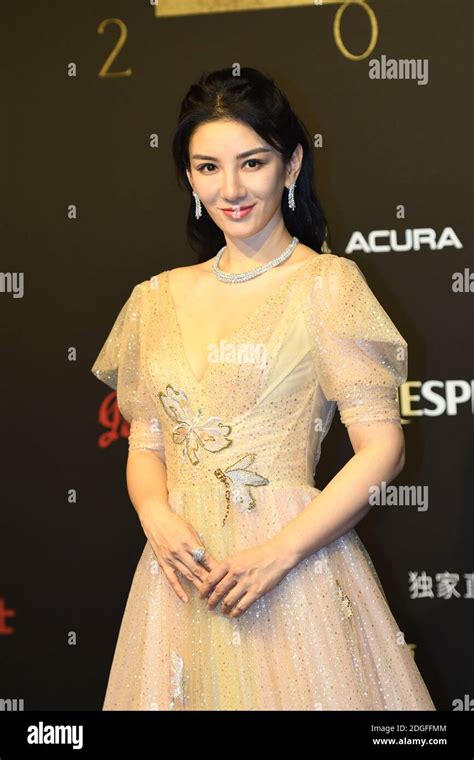 Chinese Actress And Singer Huang Yi Attends Elle Men Fashion Event In