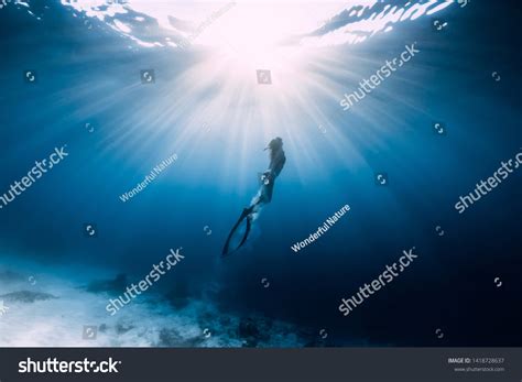 Woman Freediver Glides Over Sandy Sea Stock Photo Shutterstock