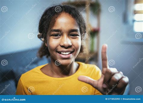 Smiling Black Deaf Girl Using Sign Language At Home Stock Photo Image