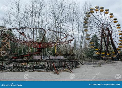 Abandoned Carousel And Abandoned Ferris At An Amusement Park In The