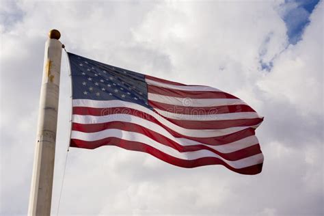 Stars And Stripes Flag Waving At The Wind In United States Stock Photo