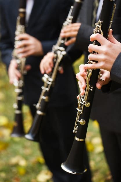 Premium Photo Group Of Musicians Playing The Clarinet