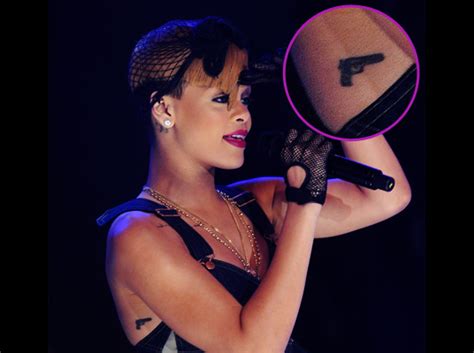 Maybe you would like to learn more about one of these? Stock Photo: Rihanna Tattoos