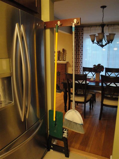 Diy Sliding Broom Holder Fits In Narrow Space Next To Fridge Made With