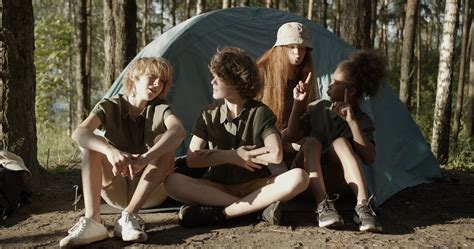 Group Of Teenagers Camping In The Woods · Free Stock Video